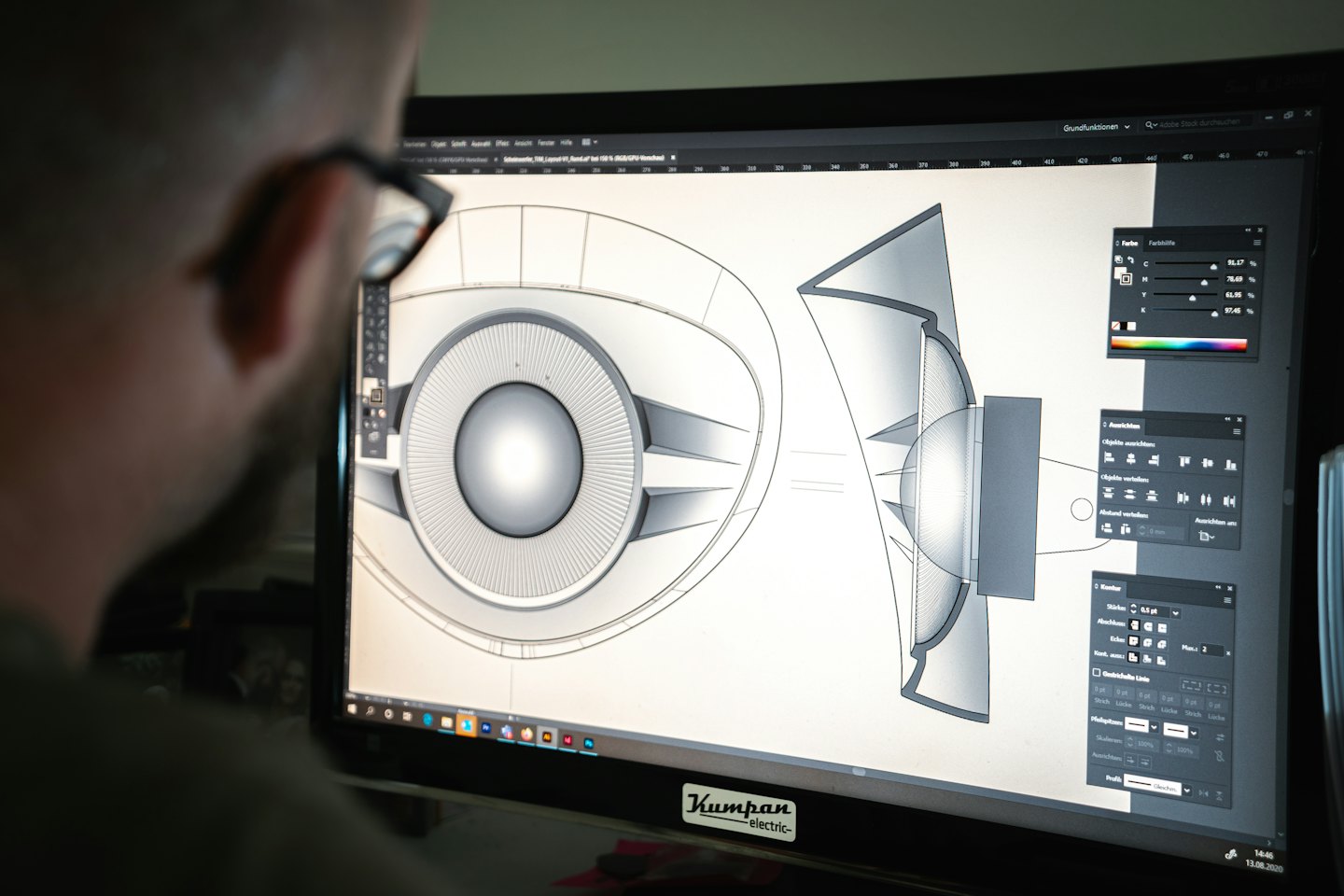 Person working on 3D design software on a computer.